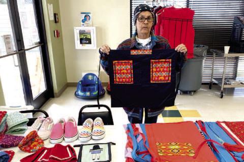 WETUMKA INDIAN COMMUNITY HELD ANNUAL SPRING BIZZARE LAST WEEK. One of the many talented exhibitors was Phyllis Noon, pictured above with several of her homemade items. These items are unique, one-of-a-kind, pieces of art. They cannot be found anywhere else in the world.