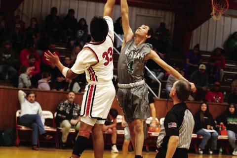 Wetumka Chieftains—Phil Ross tips off for the Chieftains this basketball season. Photos by Dane Smart, Sports Editor