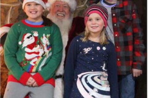 Anastasia, Jerrelin &amp; Matthew Turner were thrilled to see Santa Claus in Calvin this past week!
