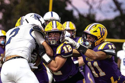 Noah Hare and Paul Lowry combine to stop the Cyril Offense