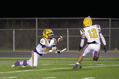 Colt Richards dives for the catch. Richards had one TD grab and several 2-point conversions on the night.