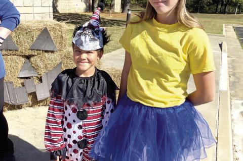 Paidan and Carter Farrow took a break from being minions and scary clowns to take a quick picture.