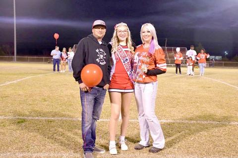 Jayla Nunez, with parents Derrek and Kristen Kelly