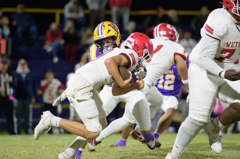 Kylar Gordon provides great blocking for his running back.