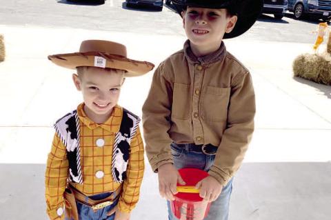 THERES SNAKE IN MY BOOT! Thomas Pena (Woody) and brother John Pena had a great time at the WWTC Halloween