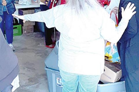 Community Angels prepare Christmas boxes