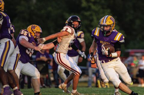 Sophomore Eli Hare cuts to the outside for a gain on the play.