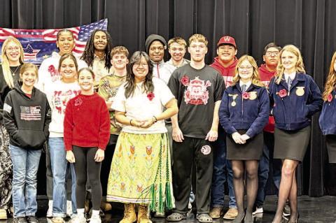 WETUMKA PUBLIC SCHOOL STUDENTS PARTICIPATED IN A VETERANS DAY PROGRAM THIS WEEK. Pictured above are: Front Row: Saige Glover, Emily Anderson, Cazli Crump, Bentley Clanton, Layla Yargee, Noah Lee, Maycie Brooks, Bella Beck, Adilyn Wilbourn. Back row: Addis