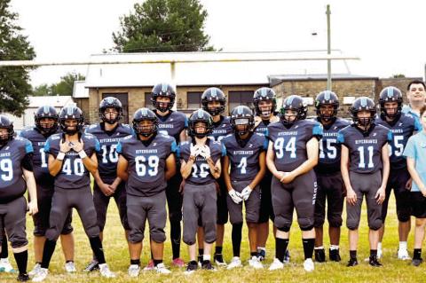 GRAHAM-DUSTIN RIVERHAWKS SET FOR SEASON WITH NEW MASCOT... Pictured above are: Front row: L to R: Deighton Corn, ball boy, Lexi Rhodes, Kurtis McCaslin, Wesley Parkhurst, Memphis Corn, Syrus Hicks, Keylee Palmer, Jackson Elliott, Rex Corn, ball boy. Back 