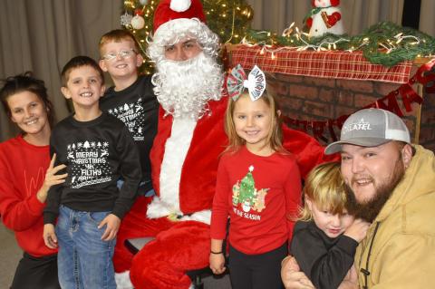 SANTA VISITS DUSTIN! It has been a busy month for Santa’s elves in Dustin. The Dustin Activities Committee sponsored an Angel Tree which served 115 children from ages birth to 6th grade. This would not have been possible without donations from Carson Ba