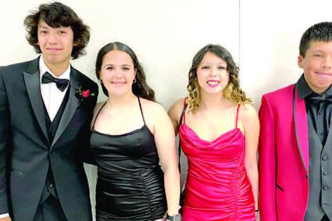 WETUMKA STUDENTS RECENTLY ATTENDED THEIR JUNIOR/SENIOR PROM. Pictured above dressed to impress are (L-R): Gill Lewis, Cailyn Cox, Brynllee Proctor, and Zach Smith