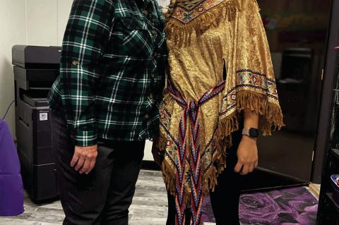 Alisha Bennett and Native American Studies teacher, Mrs. Fisher. Alisha is wearing the belt that won her the award.
