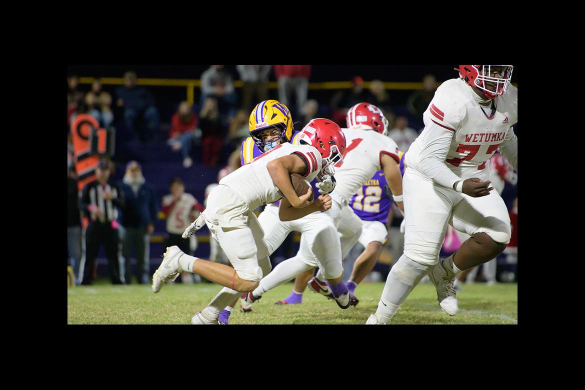 Kylar Gordon provides great blocking for his running back. Kylar Gordon provides great blocking for his running back.